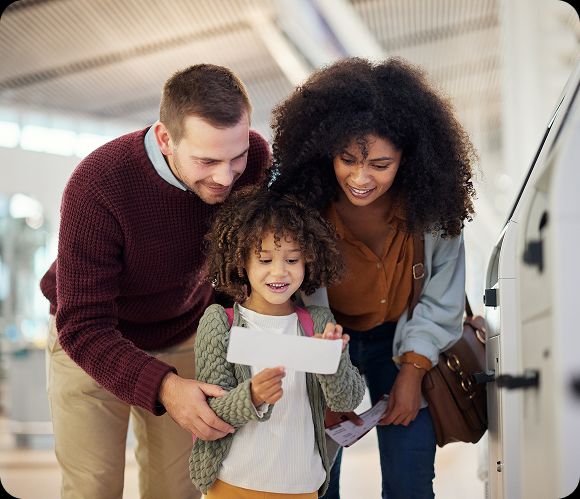 A mixed-race family with a young child using Teneo Online School to continue education while living internationally