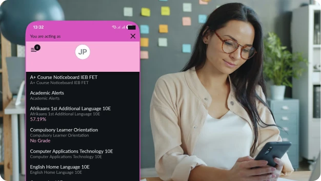 A parent reviewing her child's academic progress on the Teneo Smart Parent App on her smartphone